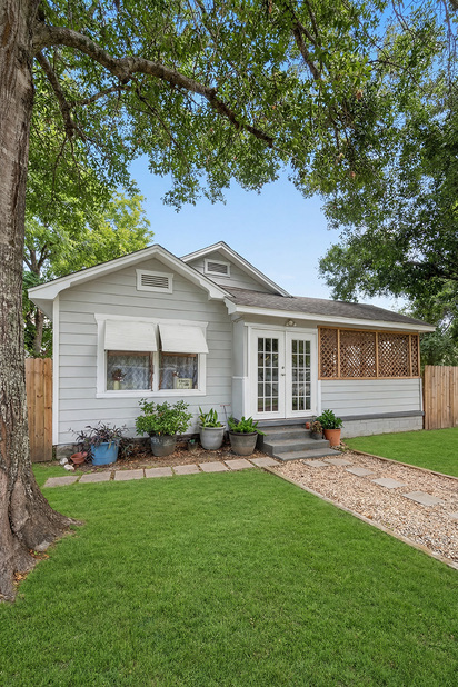 Front exterior after grass replacement