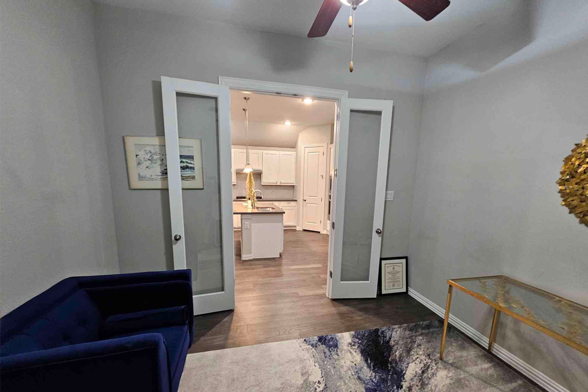 Office with leaning vertical lines before perspective correction